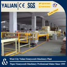 Paper honeycomb wallboard machine