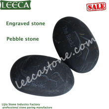 Black pebble engraved stone