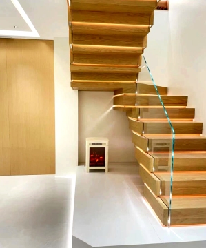 Elegant staircase with stacked wooden treads staircase