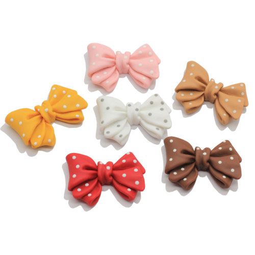 27MM Polka Dot Bow Resina Decoración Artesanía Flatback Cabochon Scrapbooking Adornos DIY Bowknot Hair Horquilla Accesorios