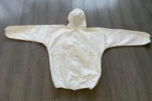 Disposable lab coat non woven