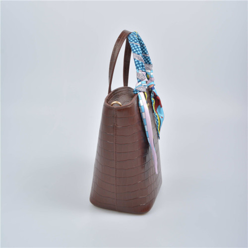 Small tote bag with long shoulder strap