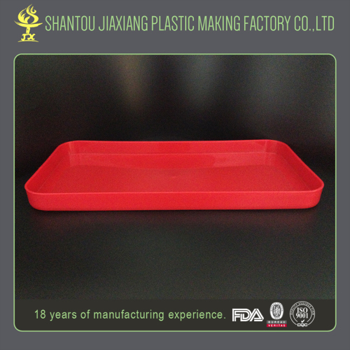 Non-slip red plastic designer food serving trays