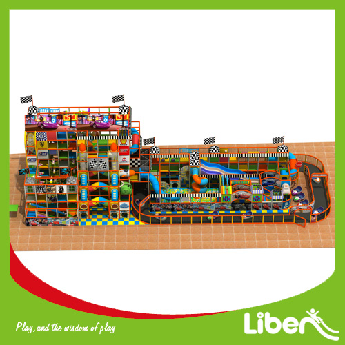 Indoor playground with slide barrier