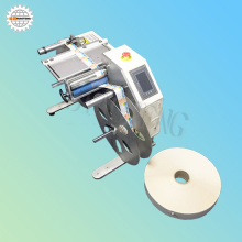 Vertical label rewinding machine