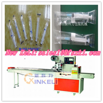 Medical syringe packaging machine