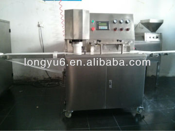 Automatic moon cake stamping machine
