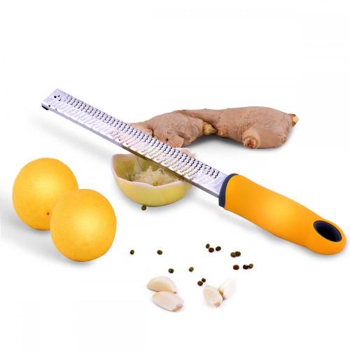 Zester de citron pour le gingembre, l&#39;ail, le chocolat, les légumes, les fruits