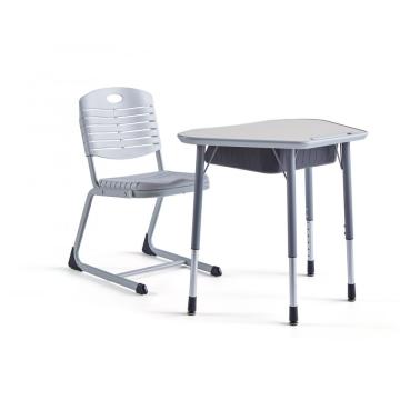 Adjustable irregular school students study desks and chairs