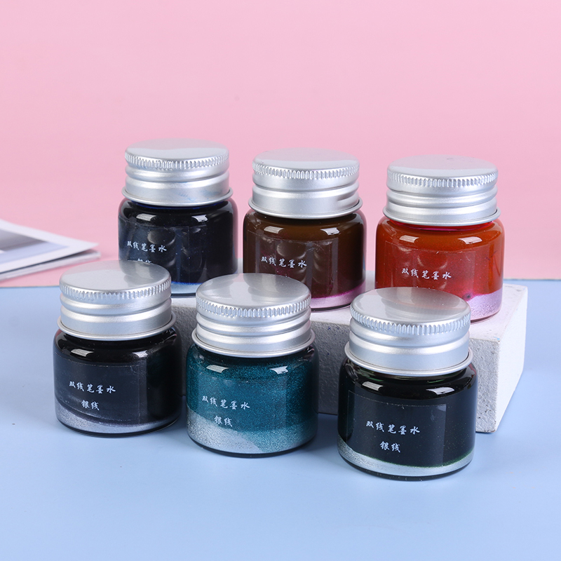 Encre fluorescente laminée à base d'eau