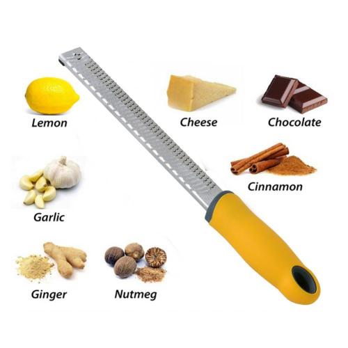 Zester de citron pour le gingembre, l&#39;ail, le chocolat, les légumes, les fruits