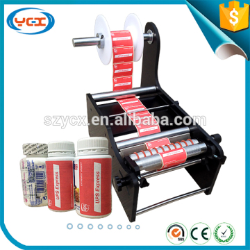 Highly Efficient round bottles labeling machine/manual bottles labeling machine for bottles