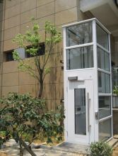 Stationary Vertical Barrier Free Lift for Wheelchairs