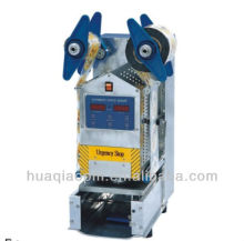 Automatic cup sealer