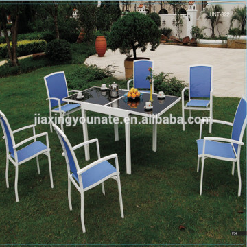 Extension glass top table with sling chair dining set outdoor furniture