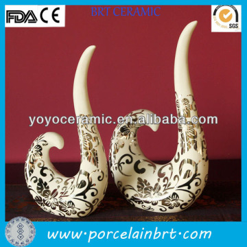 white ivory shaped ceramic thai wedding decorations