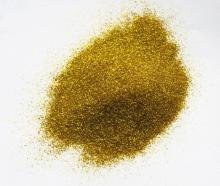 several sizes of gold glitter powder