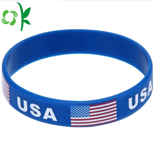 Bandes de silicone faites sur commande de logo de pays des USA de drapeau / lettre en relief