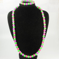 Conjunto de joyas con cuentas violeta y verde