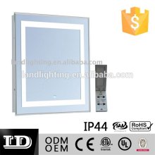 Illuminated mirror with four rectangular light slits