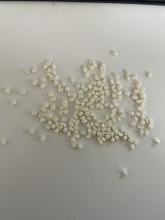 Medium oil flame retardant particles