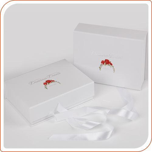 Beautiful white gift box with ribbon book shape packed box