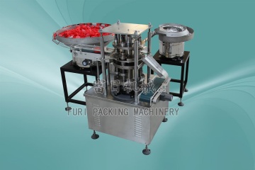 seal and cap assembly machine