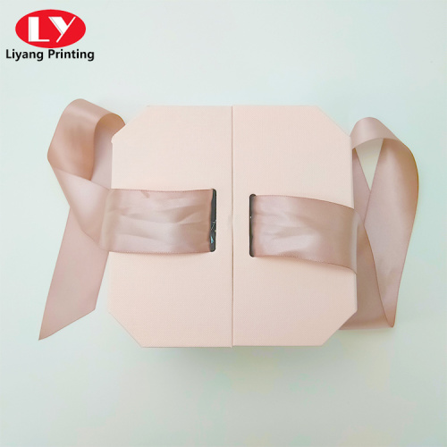 Pink octagonal double open gift box with ribbon