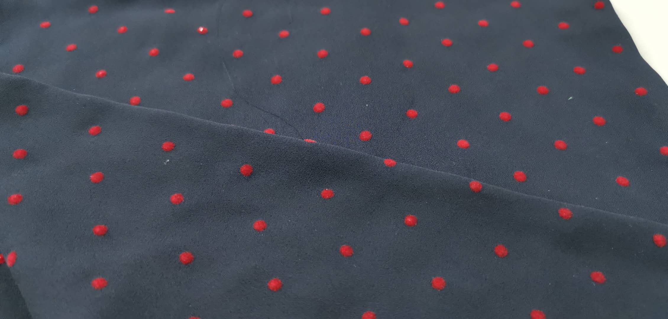100% Polyester moss crepe with Red flocking dots Inelasticfabric