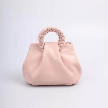 Pink dumpling handbag w/ woven handles