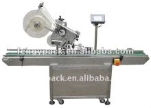 Top surface labelling machine