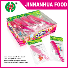 girl's comb toy with candy