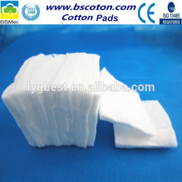 Cut square absorbent cotton pads