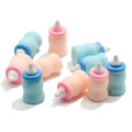 Botella de leche azul rosa para bebé, cabujón de resina, casa de muñecas para niños, juguetes, llavero, decoración artística, pulsera, accesorio para hacer joyas