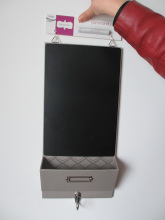 Family Using Note Board