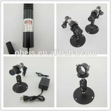 red light and Croos machine laser light