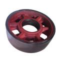 Wear resistant and impact resistant elevator guide wheel
