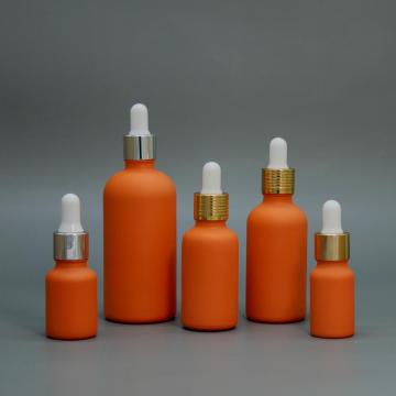 Flasche mit ätherischem Öl in Orange mit Tropfverschluss