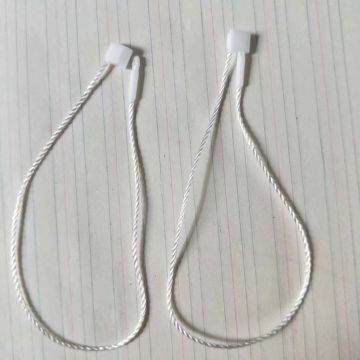 white hang tags with eyelets and ribbon tags