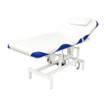 Table de massage faciale au lit