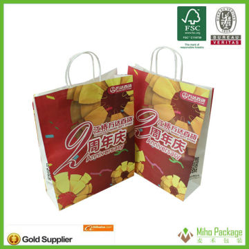 custom logo printed paper bag,garment paper packaging bag,cheap paper packaging bag