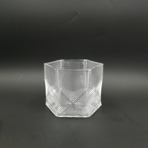 Tarro de cristal de lujo con forma hexagonal en relieve con tapa