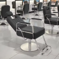 Muestra gratuita Al por mayor elevación giratoria PU cuero de acero inoxidable salón de belleza giratriz de peatillo que corta el cabello silla de peluquería