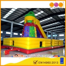 AOQI EN14960 certified outdoor inflatable rock climbing sports game for adults for sale