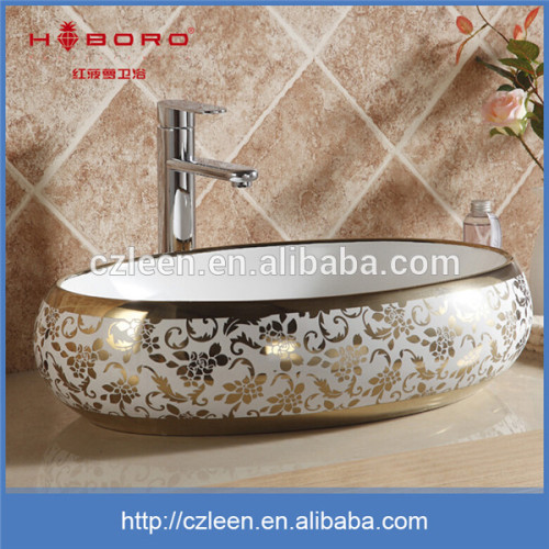 Alibaba china above counter ceramic round gold art wash basin models price