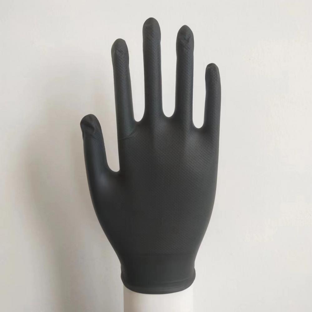 Disposable nitrile examination gloves