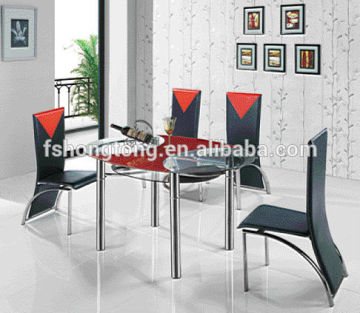 Temper glass dining table and PVC chairs