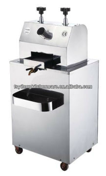 Electric sugar cane juice extractor