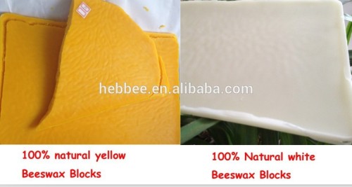 White and yellow natural beeswax blocks