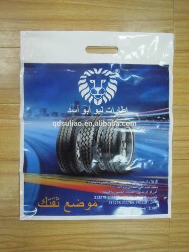 Die cut handle plastic bag with reinforcement handle